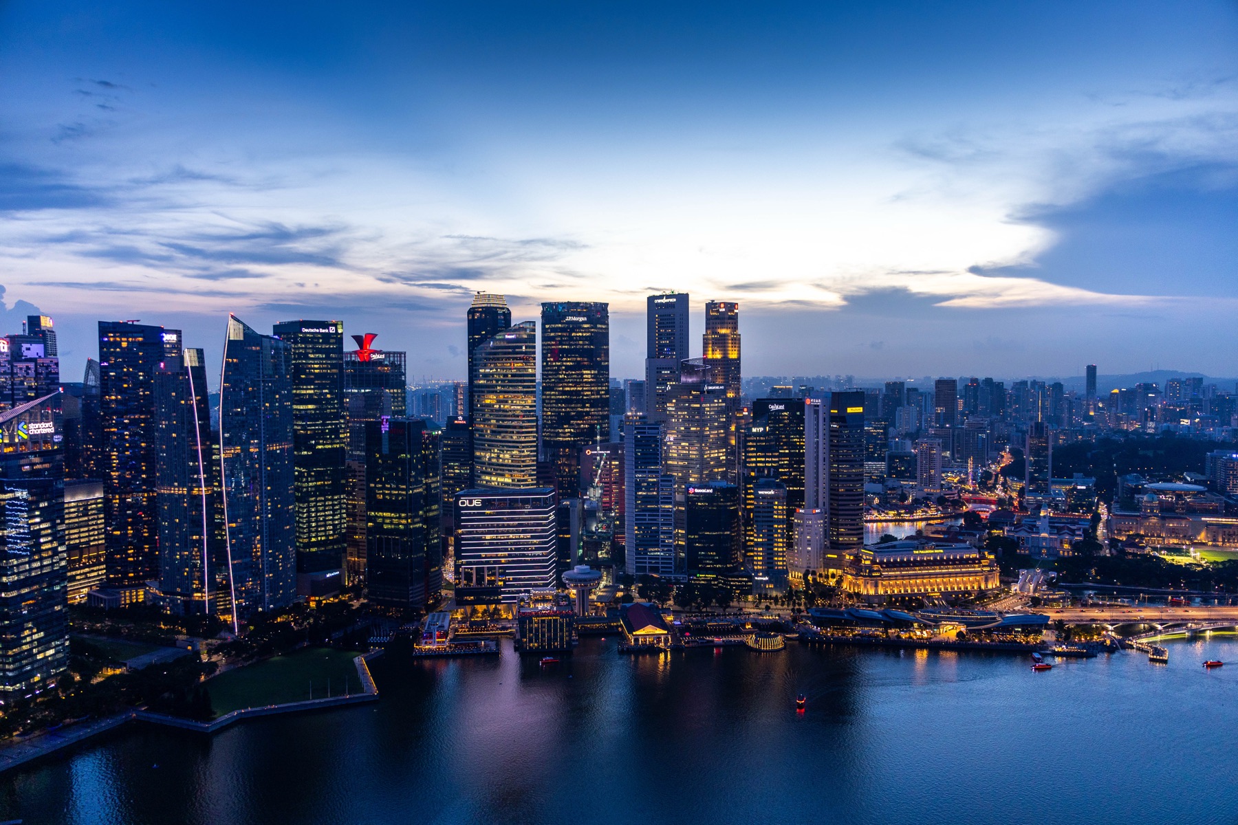Singapore skyline and Marina Bay during blue hour.